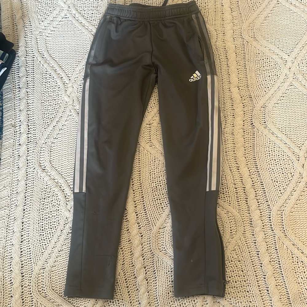 Gray adidas tiro pants.